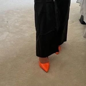 Orange stiletto heels